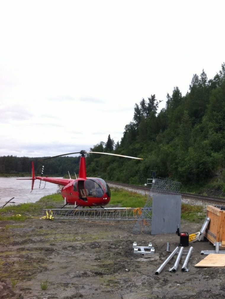 forest and lake surroundings with helicopter